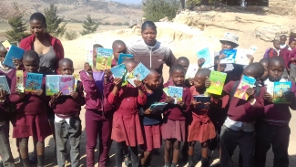 Lesotho children with their lead teachers