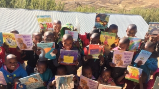 Excited children at Litoetse Primary with their books